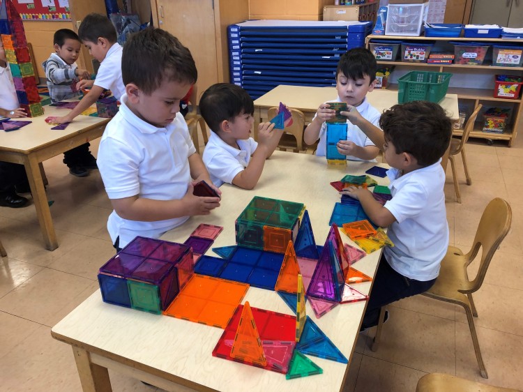 studnets working magnatiles